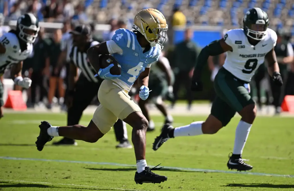 UCLA wide receiver Semaj Morgan (4) catches a pass for...