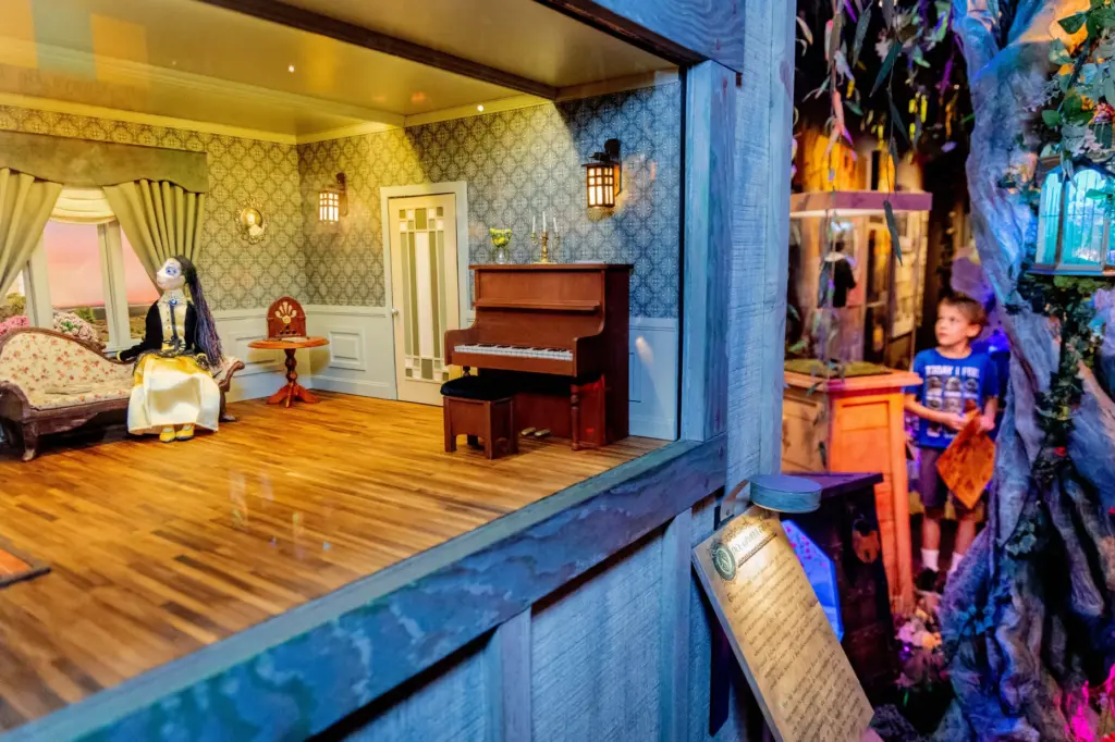 A detailed mini diorama awaits as Ezra Davis, 9, explores...