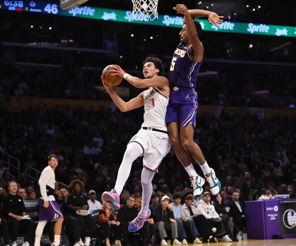 Clippers rookie guard Keaton Wagler drives to the basket as...