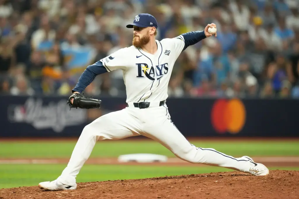 Tampa Bay Rays relief pitcher Cam Booser throws to the...