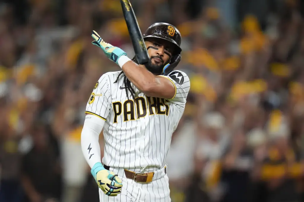 San Diego Padres star Fernando Tatis Jr. flips his bat...