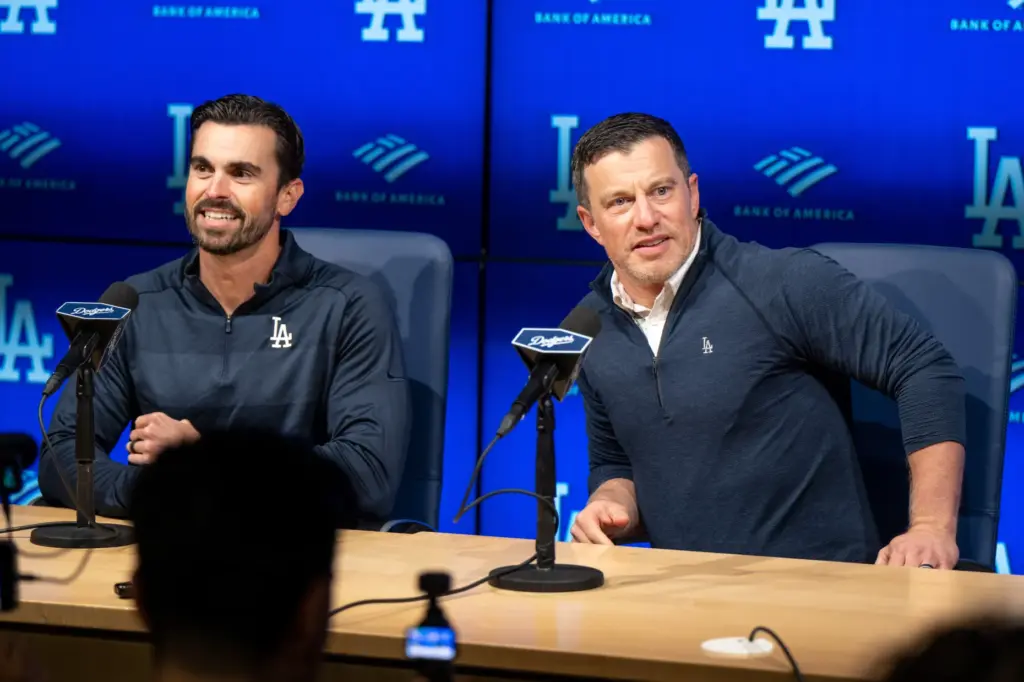 Dodgers president of baseball operations Andrew Friedman, right, and Dodgers...