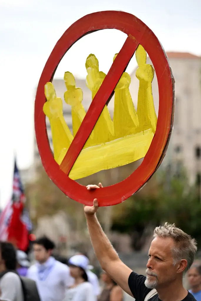 No Kings protesters rally and march in downtown Los Angeles...