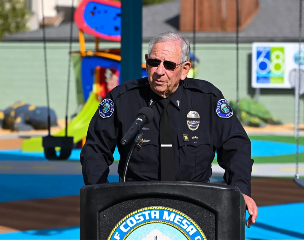 Costa Mesa Police Chaplin Dave Brooks during a ceremony for...
