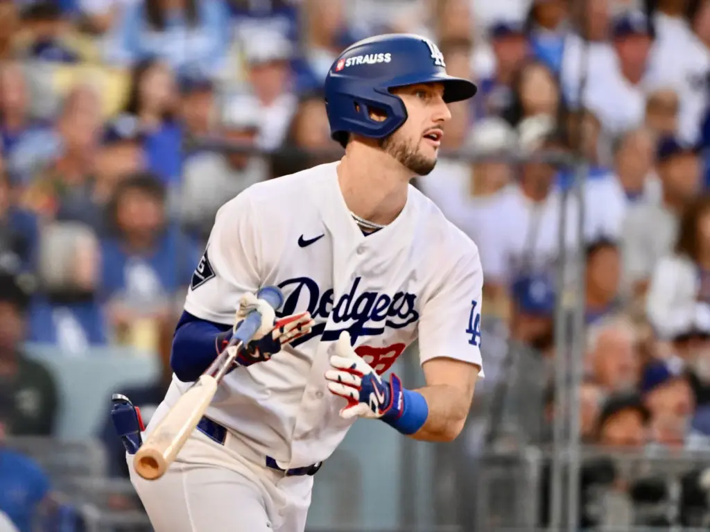 The Dodgers’ Kyle Tucker hits a single during the second...