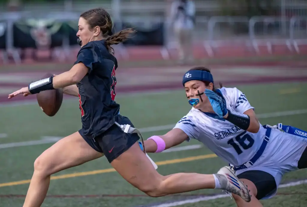 JSerra quarterback Kate Meier (13) carries the ball on a...
