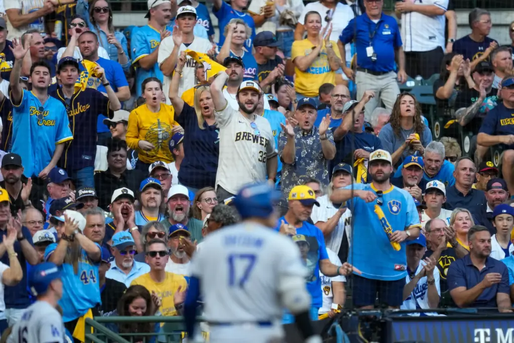 Fans cheer after Dodgers star Shohei Ohtani (17) struck out...