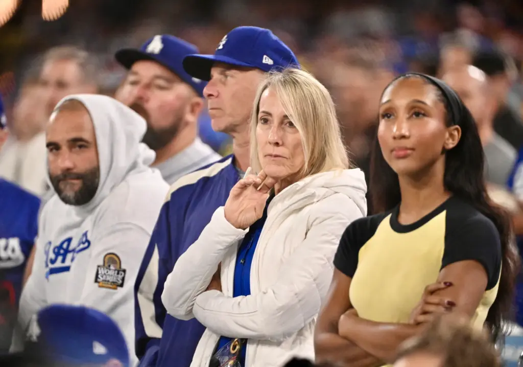 Dodgers fans look on during the ninth inning of Game...