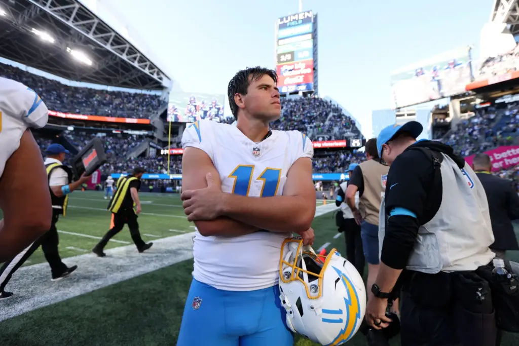 Chargers place kicker Cameron Dicker (11) stands on the field...