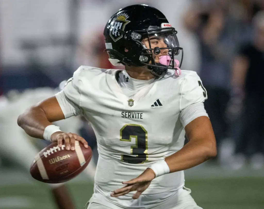 Serviteâs Gino Wang (3) looks to pass during a high...