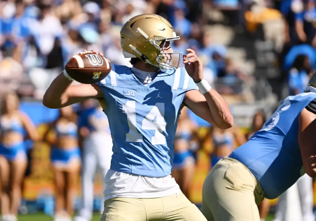 UCLA quarterback Ty Dieffenbach (14) throws a pass against Michigan...