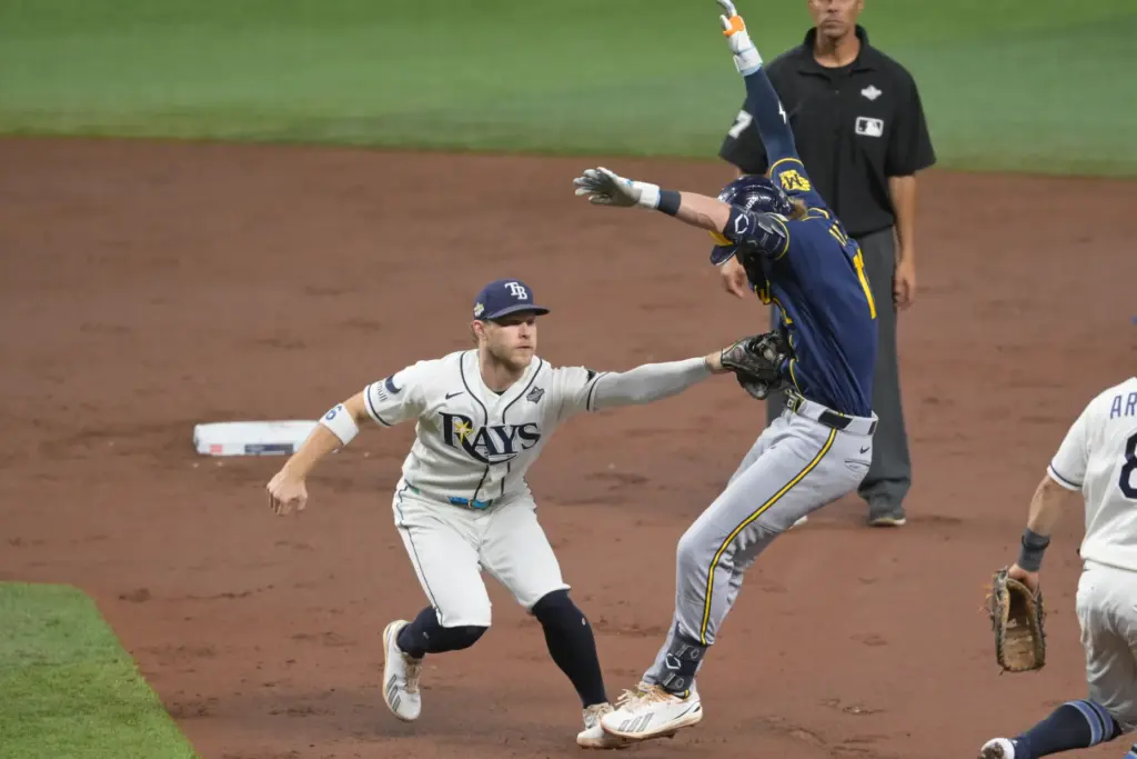 Tampa Bay Rays shortstop Taylor Walls tags out the Milwaukee...