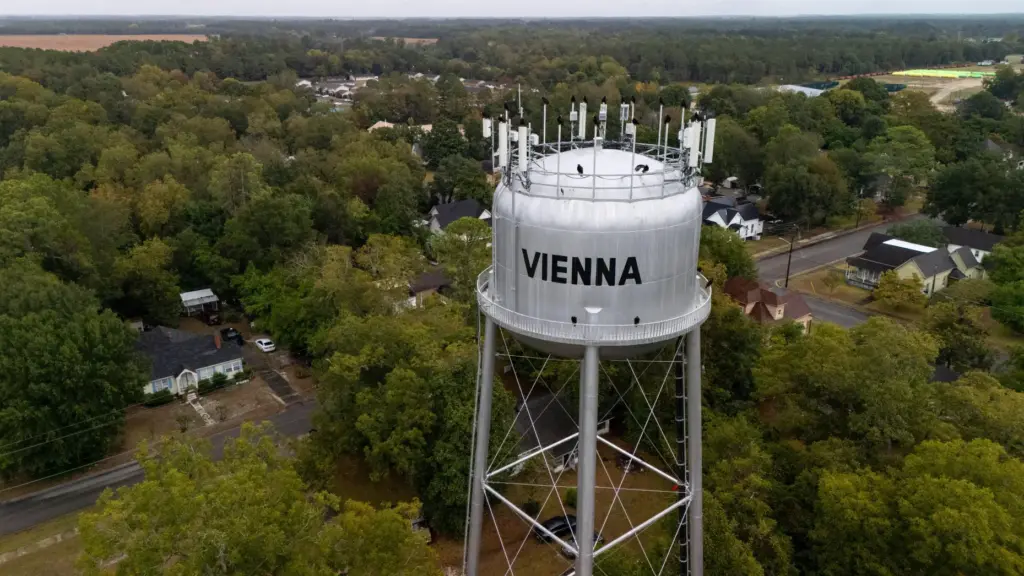A water tower is seen as investigators work the scene of a mass shooting.