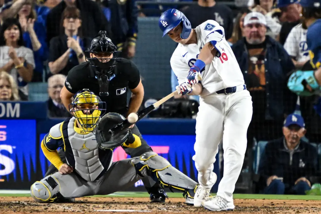The Dodgers’ Will Smith connects for a two-run double to...