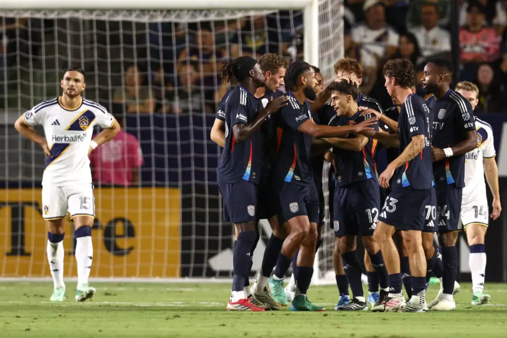 San Diego FC midfielder Gabriel Pirani (12) celebrates with teammates...