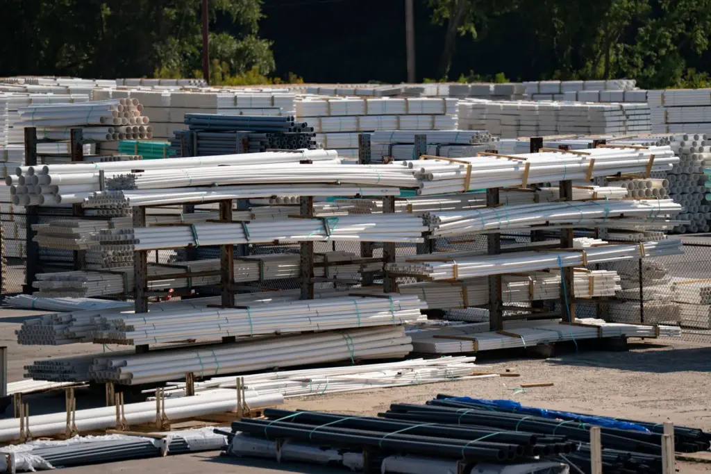 PVC pipe is stacked at the IPEX factory that makes...