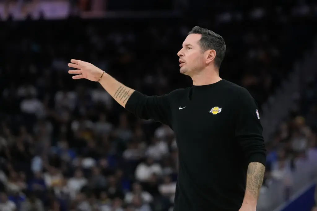 Lakers head coach JJ Redick gestures from the sideline during...
