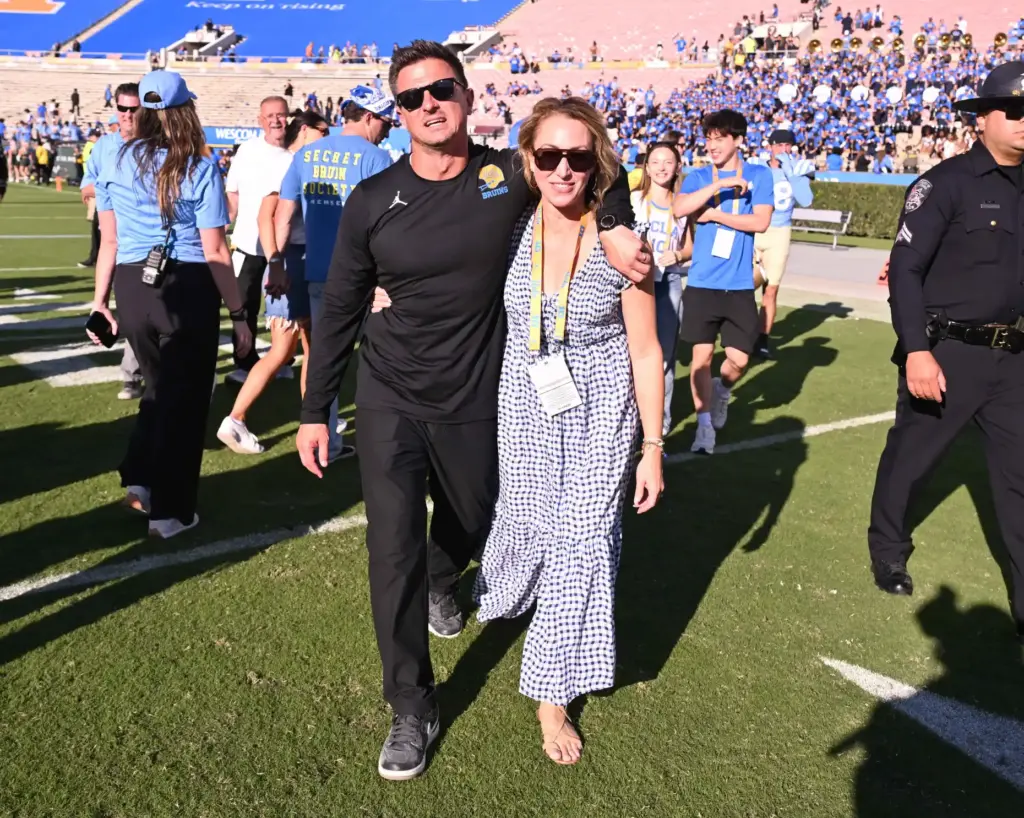Head coach Bob Chesney of the UCLA Bruins walks of...