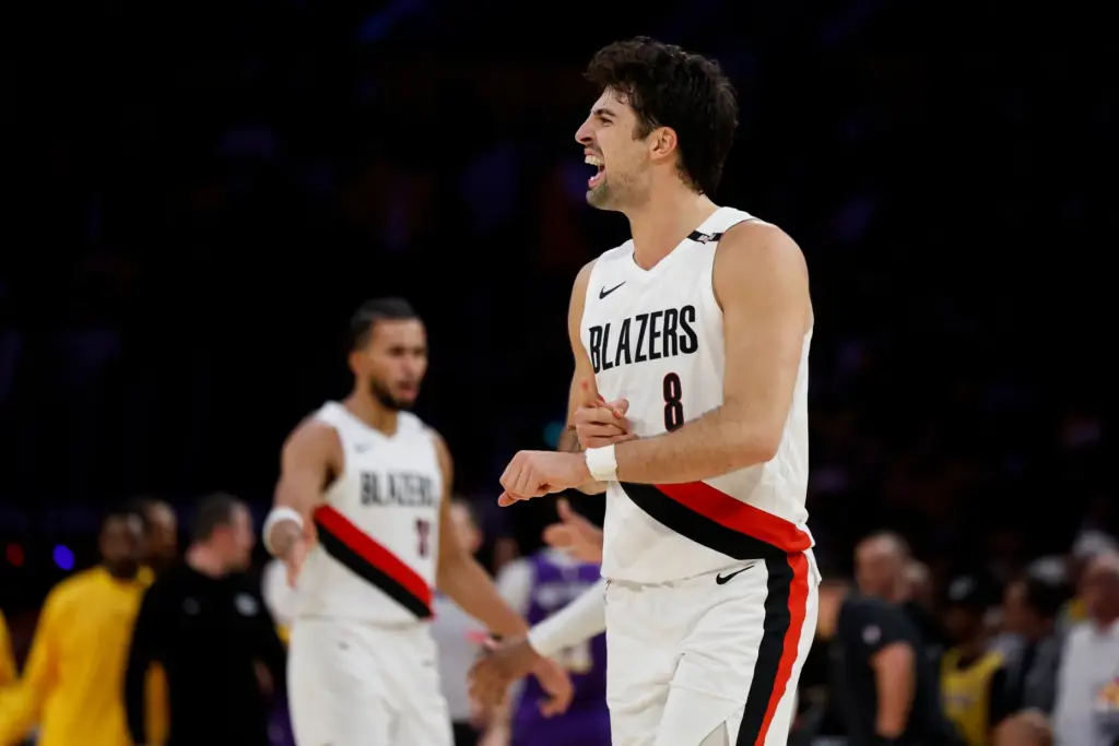 Portland Trail Blazers forward Deni Avdija reacts after teammate Damian...