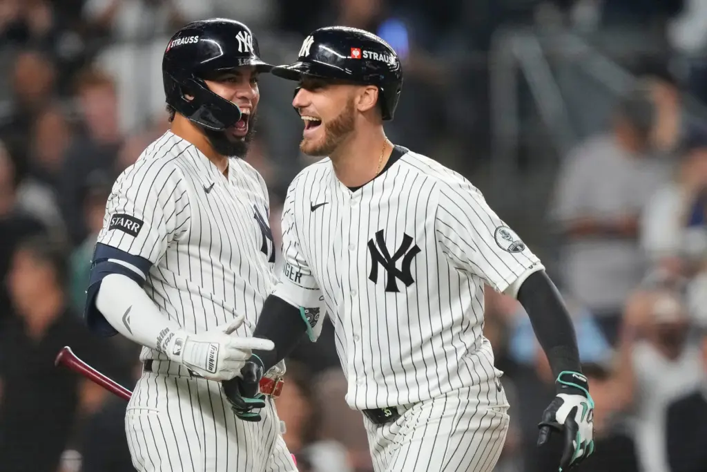 The New York Yankees’ Cody Bellinger, right, celebrates with teammate...