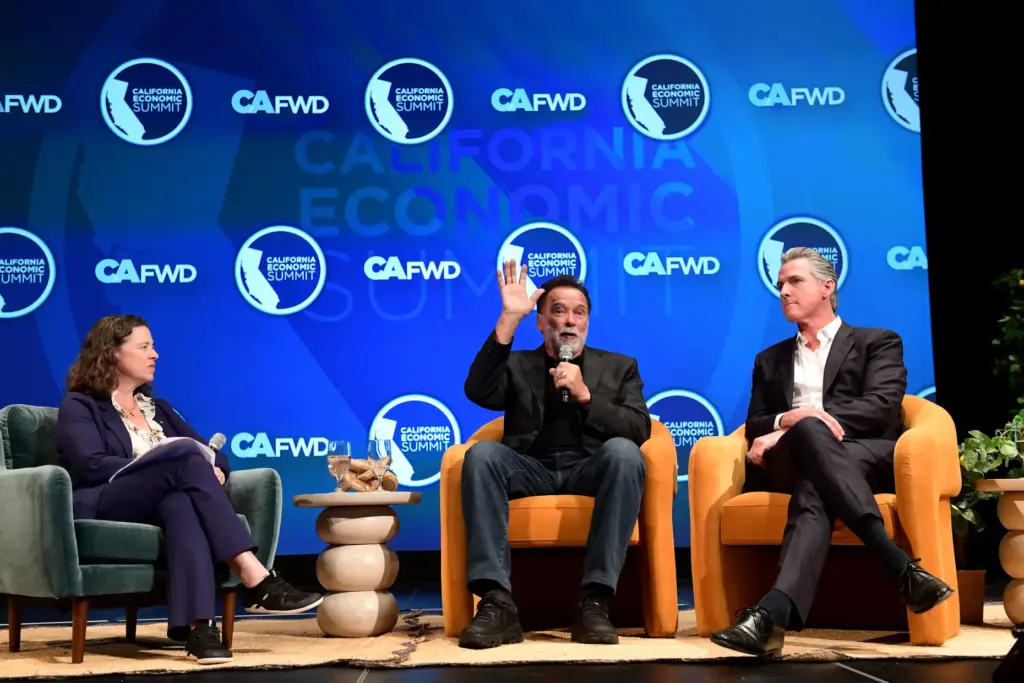 Governor Gavin Newsom participates in a fireside chat with former...