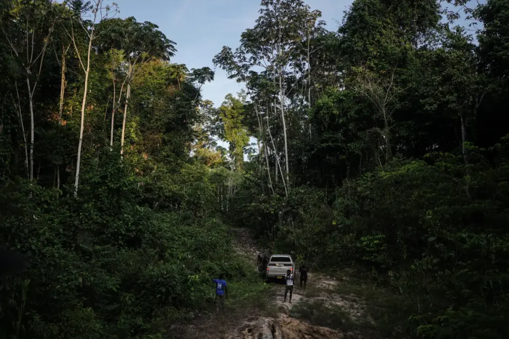 Members of the Saamaka community patrol in Ebbatop, Suriname, Saturday,...