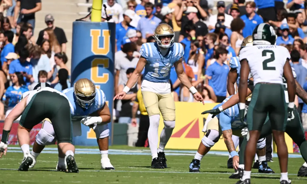 UCLA quarterback Ty Dieffenbach (14) looks on during the first...