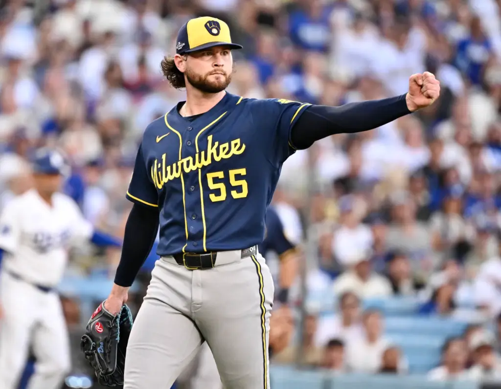 Dodgers starting pitcher Shane Drohan reacts after getting the Dodgers’...