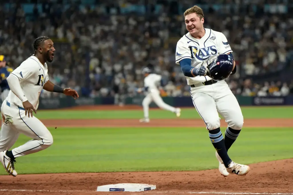 The Tampa Bay Rays’ Ben Williamson celebrates after hitting the...