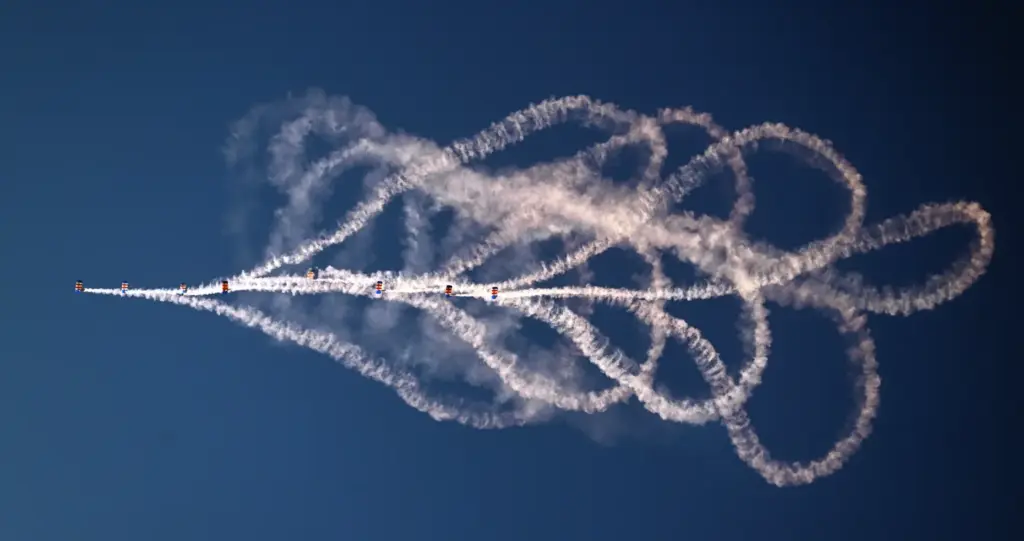 The Royal Air Force Falcons Parachute Team perform during the...
