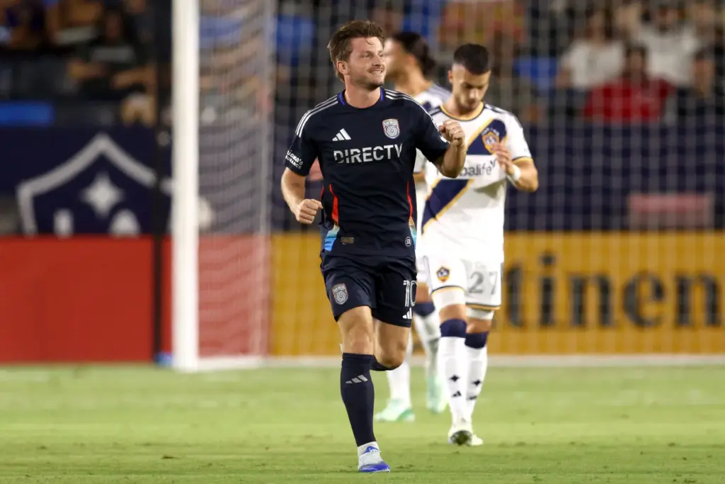 San Diego FC forward Anders Dreyer, front, celebrates after scoring...