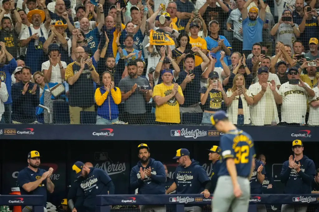 Fans cheer as Milwaukee Brewers starting pitcher Jacob Misiorowski walks...