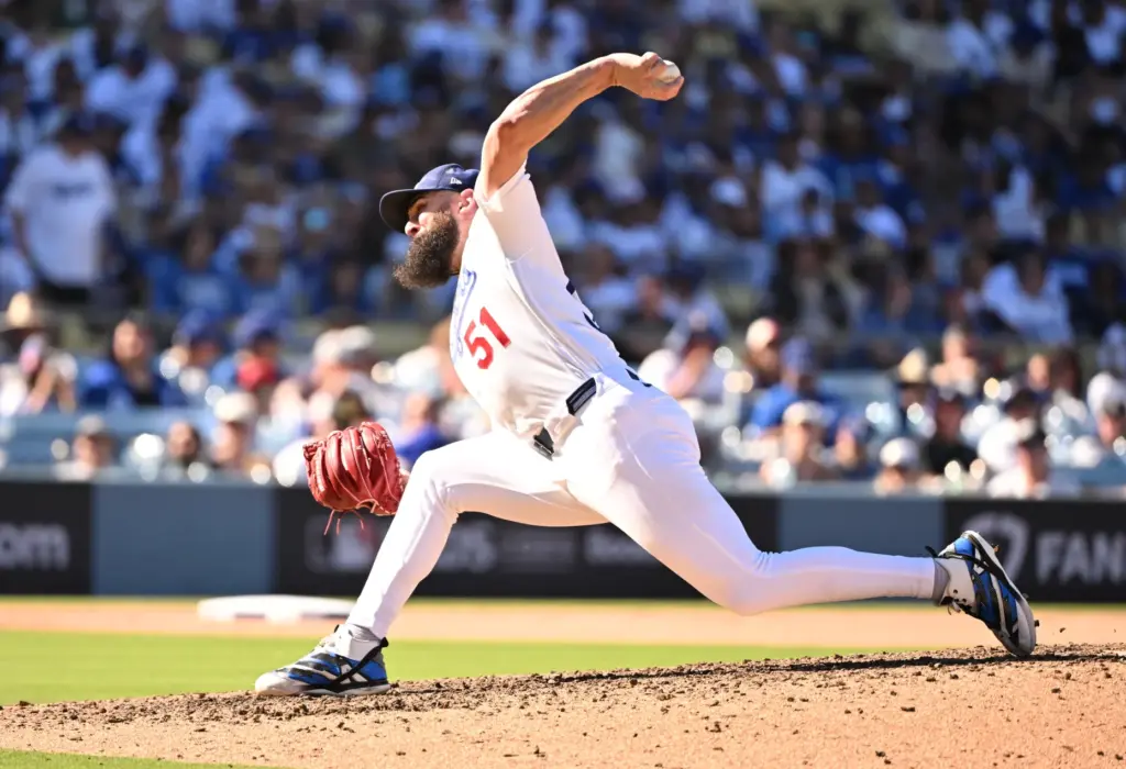 Dodgers relief pitcher Alex Vesia throws to the plate during...