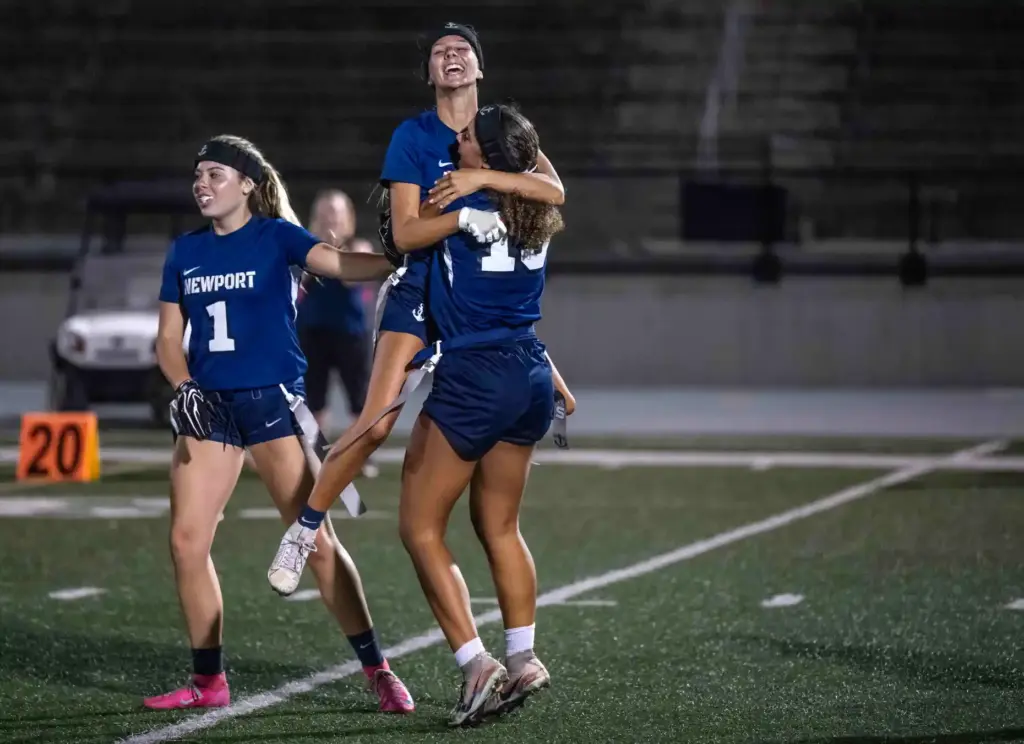 Newport Harbor players celebrate a touchdown during a Sunset League...