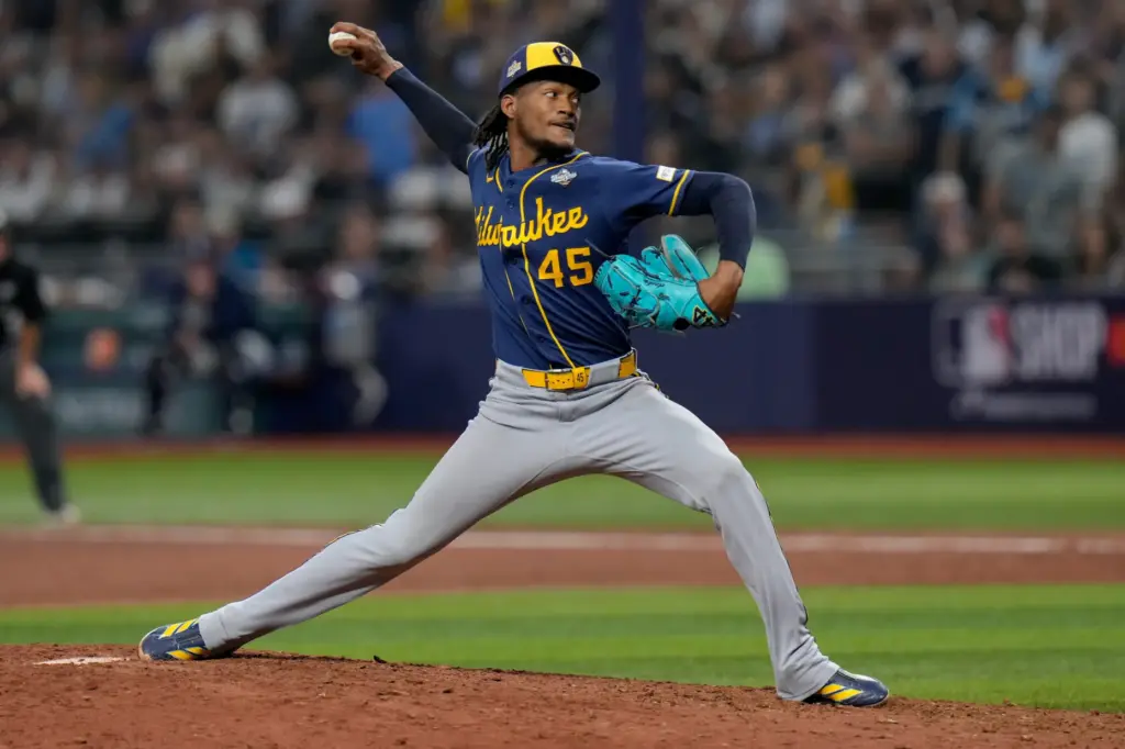 Milwaukee Brewers pitcher Abner Uribe throws during the seventh inning...