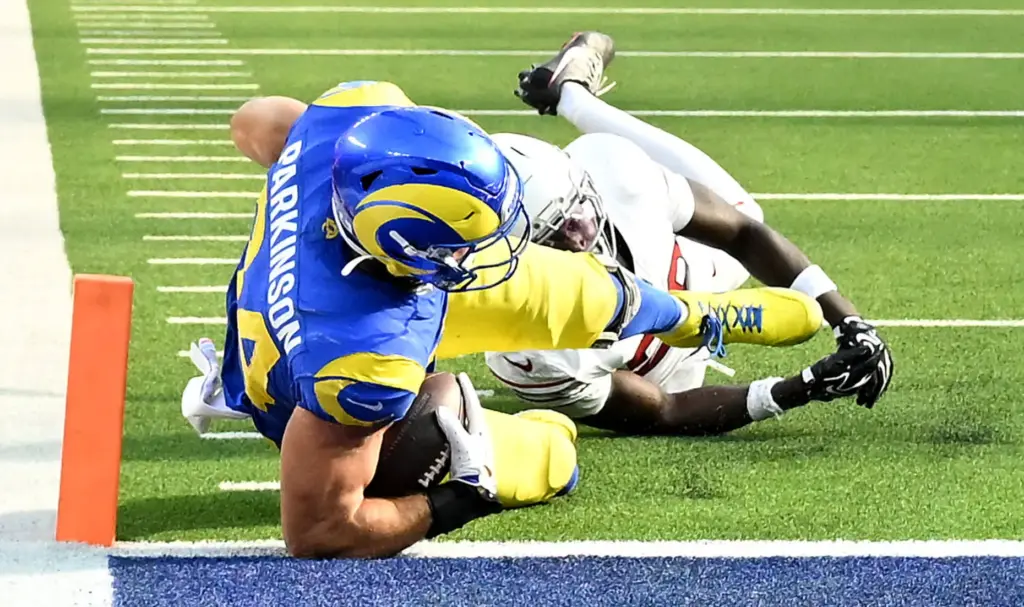 Rams tight end Colby Parkinson (84) lands in the end...