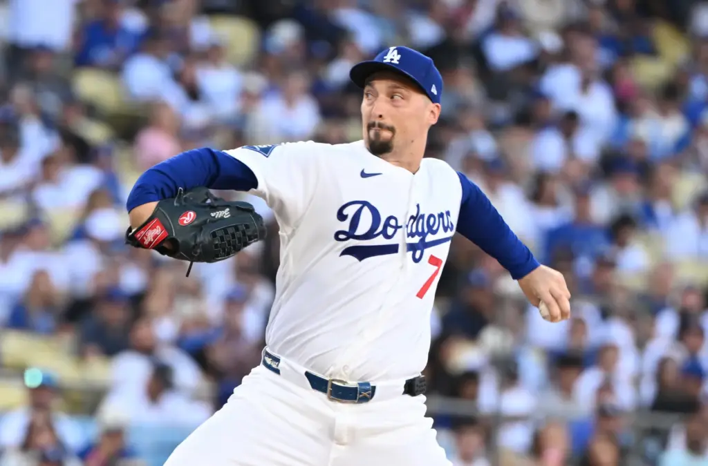 Dodgers starting pitcher Blake Snell throws to the plate during...