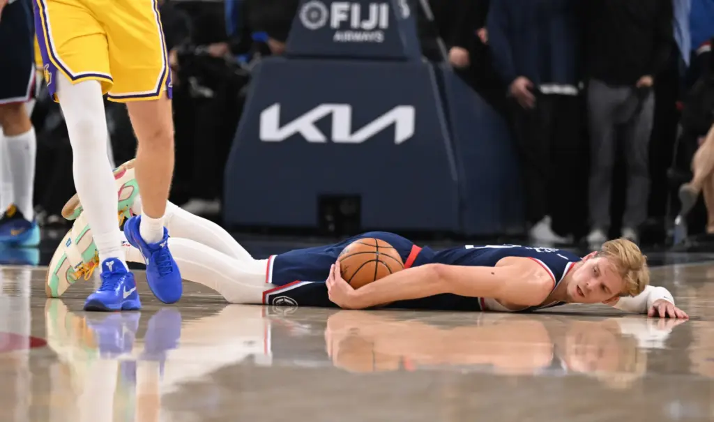 Clippers guard/forward Gradey Dick dives for the ball during the...