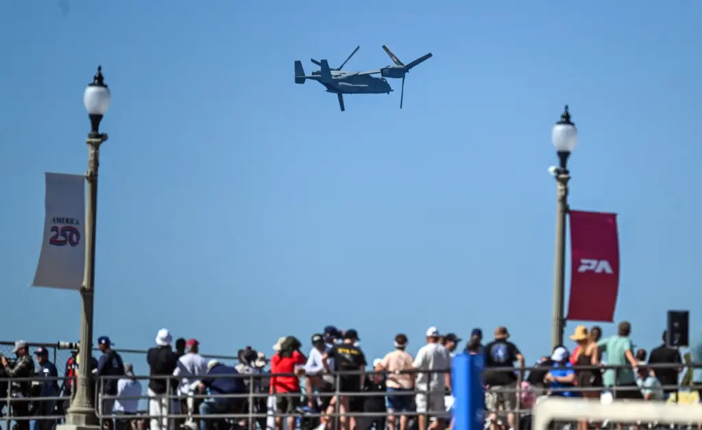A United States Marine Corps MV-22 Osprey flies during the...
