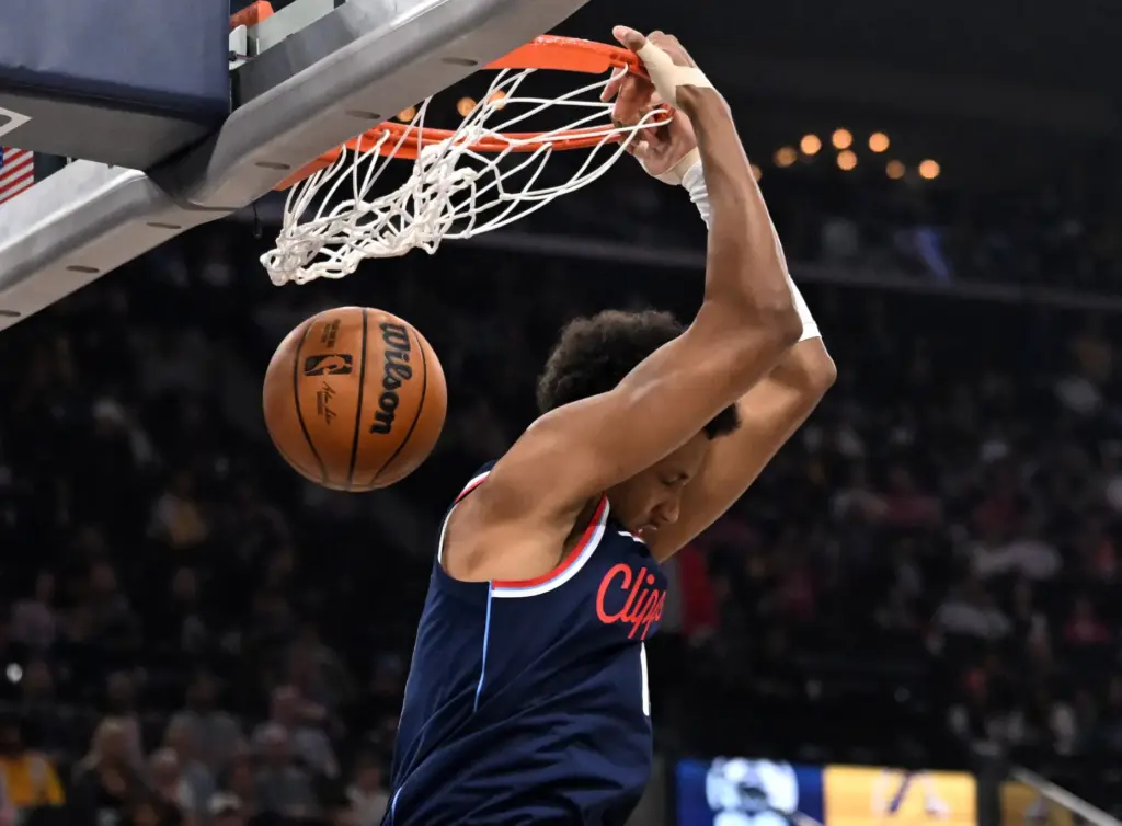 Clippers rookie forward Baba Miller dunks during the first half...