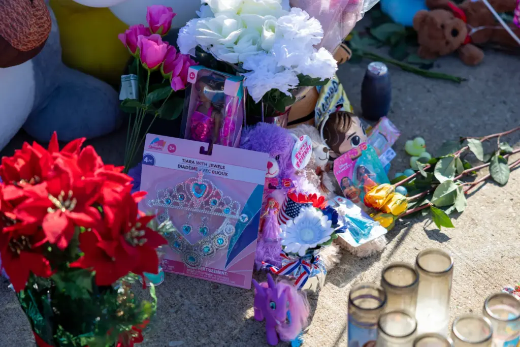 Candy, toys, balloons, dollar bills and other items are left...