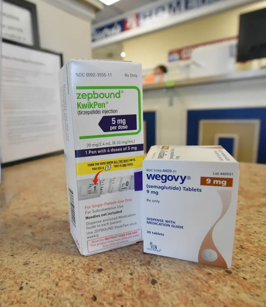 GLP-1 medication is shown on the counter at DePietro’s Pharmacy...
