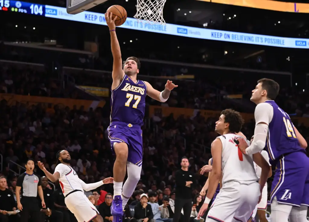Lakers star Luka Doncic drives to the basket during the...