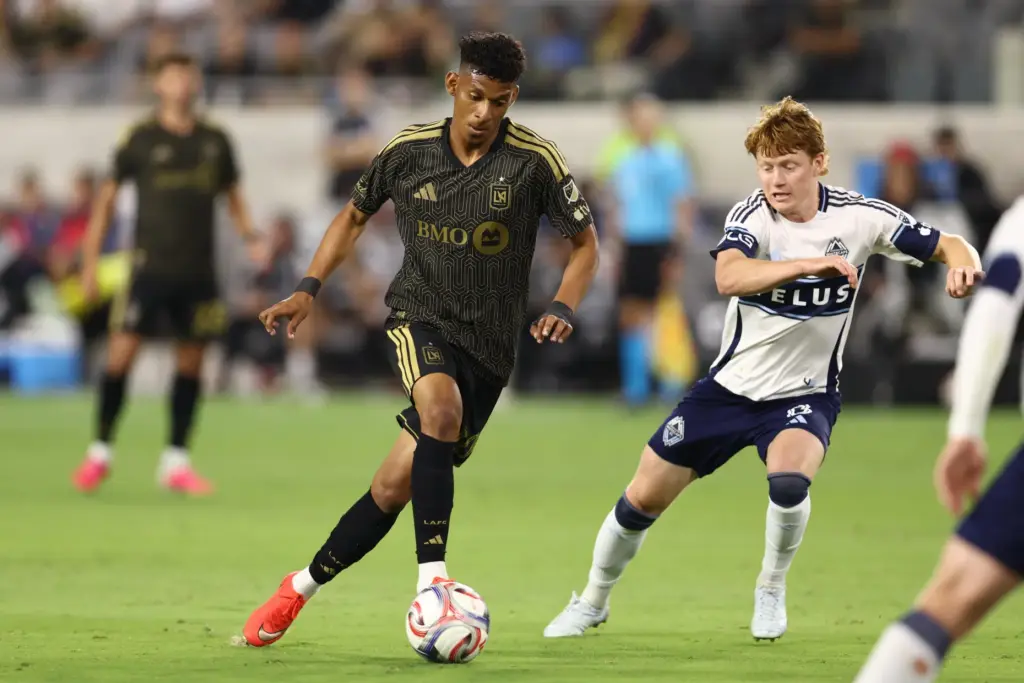 Los Angeles FC midfielder Sergio VÃ¡squez, left, controls the ball...
