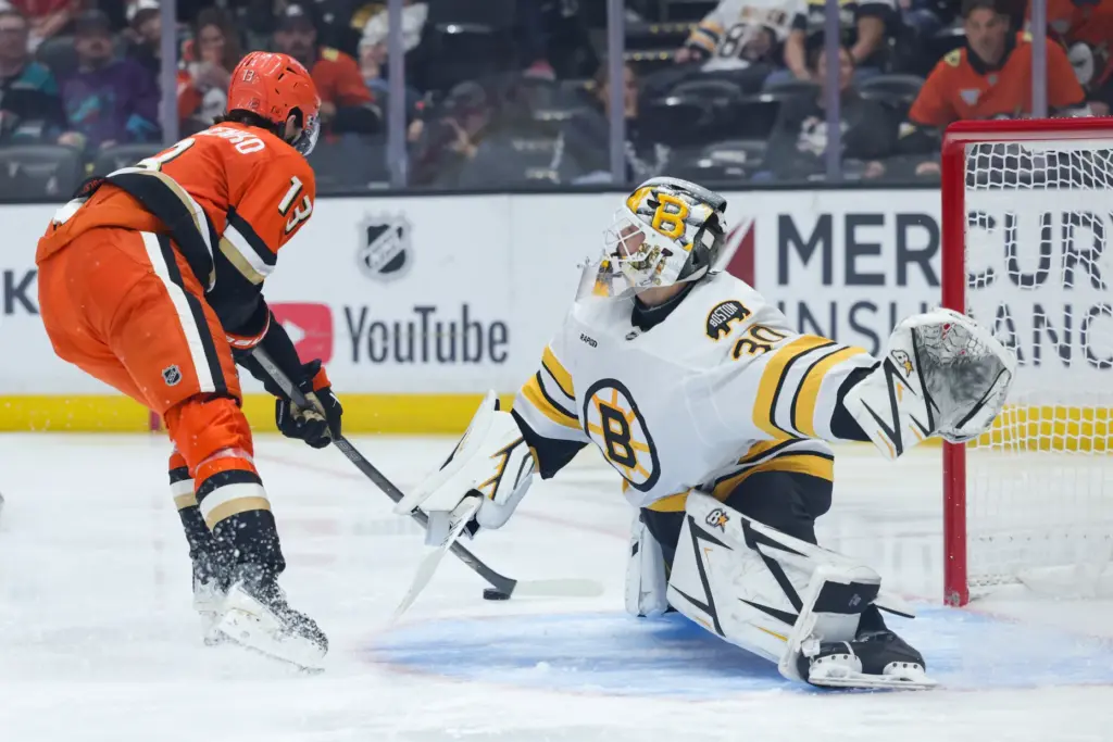 Ducks center Nikita Nesterenko, left, is unable to score against...