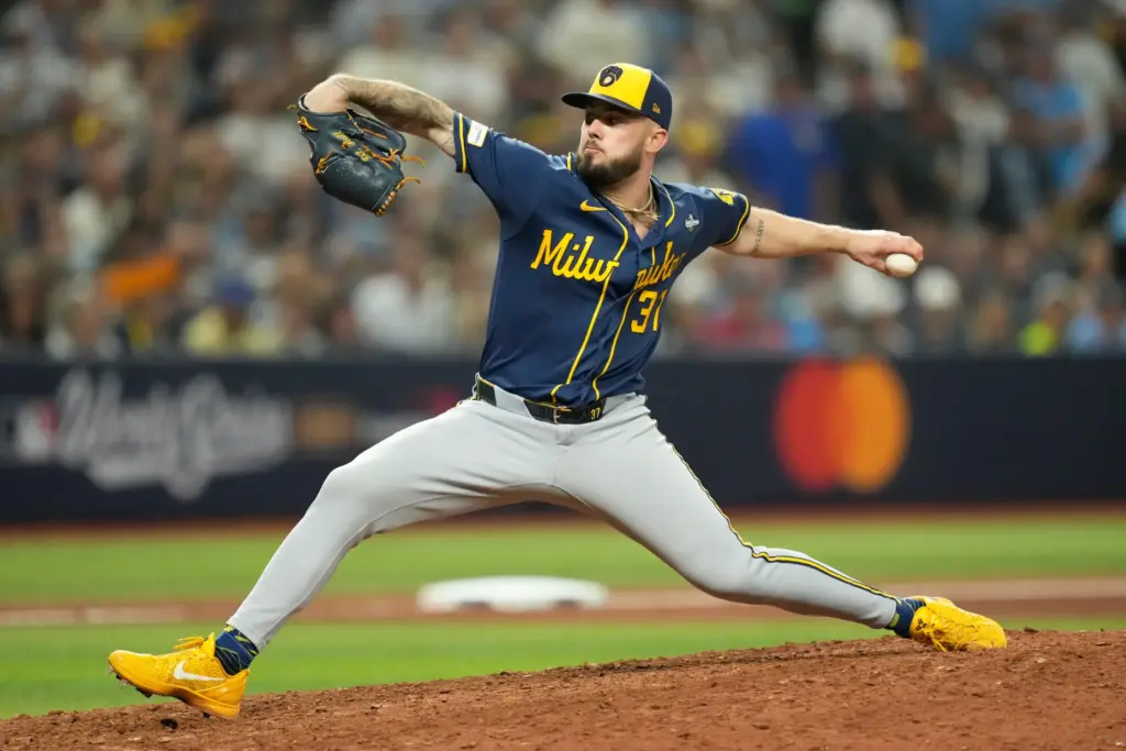 Milwaukee Brewers relief pitcher DL Hall throws to the plate...