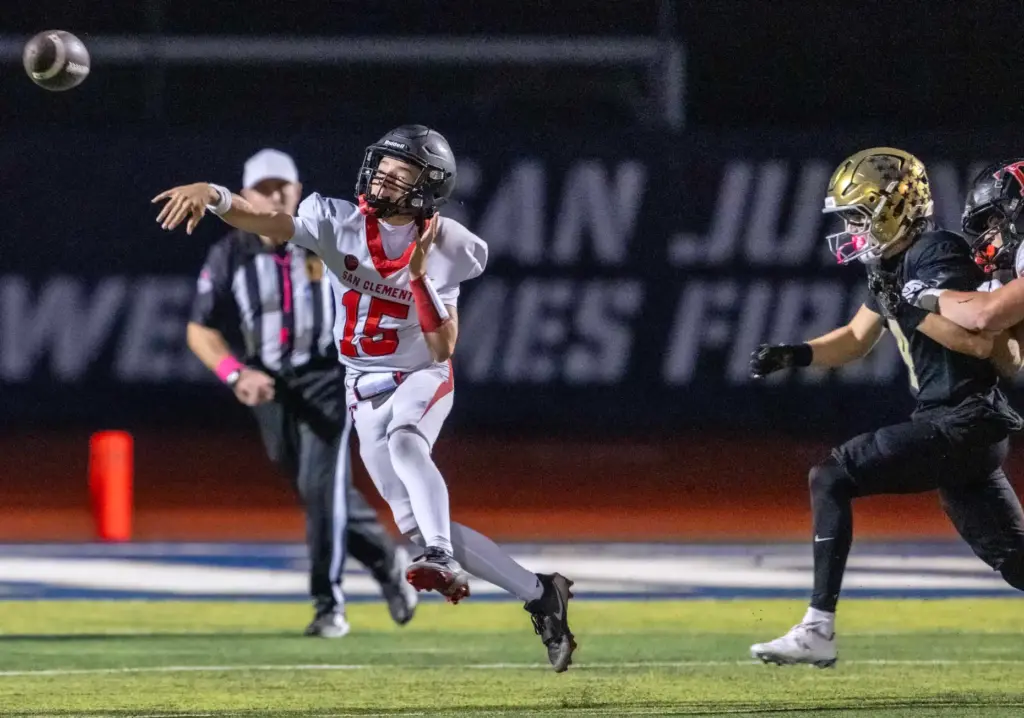 San Clemente quarterback Koston James (15) throws the ball during...