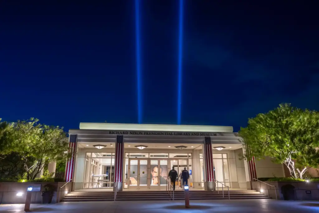 Two beams of lights illuminate the sky above the Richard...