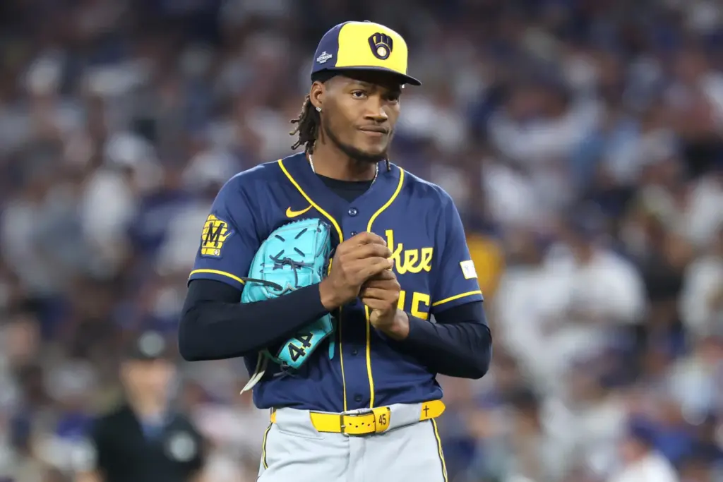 Milwaukee Brewers relief pitcher Abner Uribe stands on the mound...