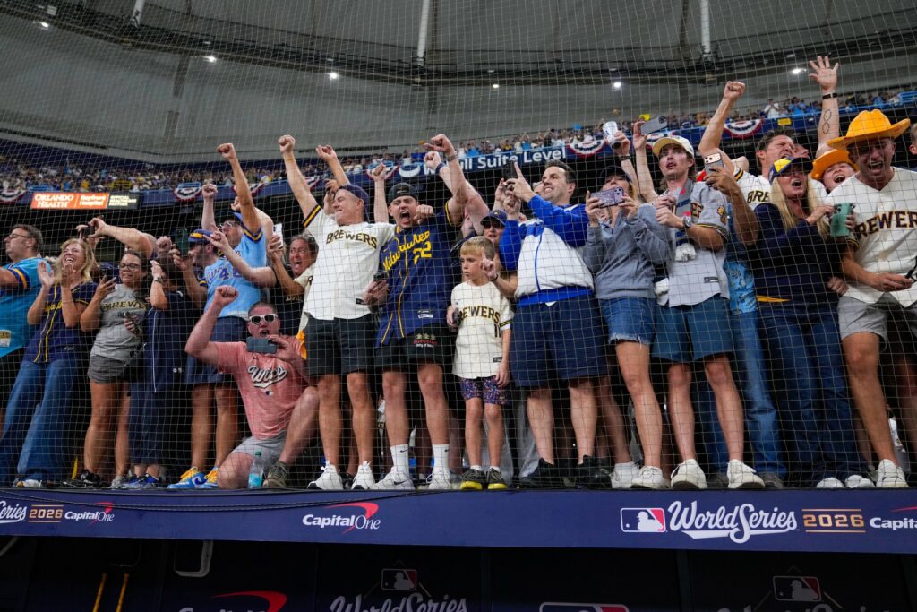 Milwaukee Brewers fans celebrate after the Brewers won baseball’s World...
